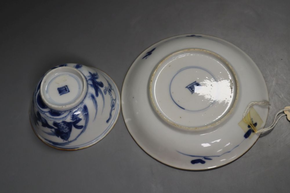 A Chinese Kangxi blue and white leaping carp tea bowl and saucer, 13cm diameter